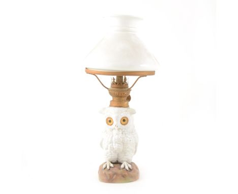 Edwardian porcelain Owl nursery oil lamp, white glass shade. H. 34cms.