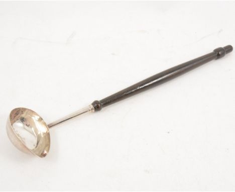 A silver punch ladle with wooden handle, plain polished bowl, overall 36cm, makers mark IW, possibly London 1739.