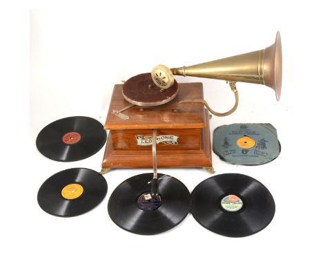 Leophone gramophone record player, with horn, handle and side glass panels, along with a small selection of early 78s records
