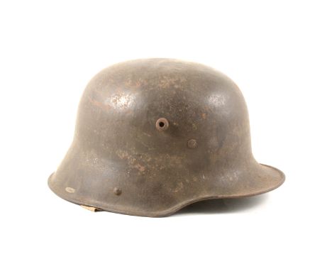 WWI German war helmet, lacking chinstrap.