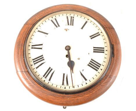An oak cased wall clock, cream enamel dial, Roman numerals, fusee movement, 41cm diam.