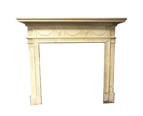 An Edwardian painted pine fire surround, in the Adam style, rosette and swag moulding, width 149cm, depth 23cm height 132cm.