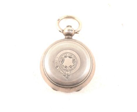 A silver sovereign case, Alfred Wigley, Birmingham 1899, engine-turned finish with vacant escutcheon to front, 30mm diameter,