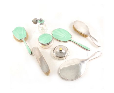 A four piece silver and green enamel dressing set by Adie Brothers Ltd, Birmingham 1934, comprising brush, hand mirror, pot a