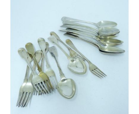 An assortment of 18th and 19th century silver flatware, comprising six old english pattern dessert spoons and a dessert fork,