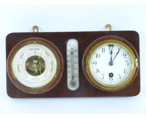A wall mounted clock and barometer, inscribed W Ludolph AG, Hamburg, separated by a thermometer, 32cm wide