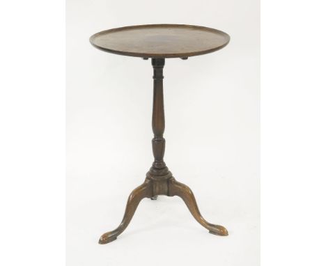 A George III mahogany tripod table, with a dished top and baluster turned column, 50.5cm diameter