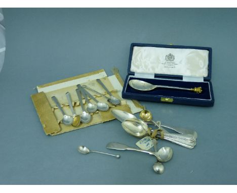 A set of seven Danish coffee spoons, by E Nielsen, with scroll terminals, a 'Silver Jubilee' silver spoon with gilt crown fin