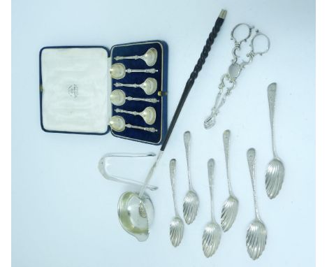 A matched set of six Georgian silver teaspoons, with shell bowls, a Georgian punch ladle, with twisted whalebone handle, 34cm