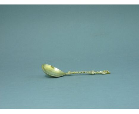 A Victorian silver gilt spoon, by Charles Thomas Fox & George Fox, London 1854, crested, the finial modelled as a mother and 