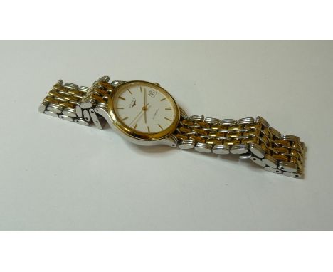 A gentleman's bi-colour Longines Flagship automatic bracelet watch, circular white dial, raised gilt batons and hands, centre