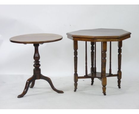 A mahogany tripod table, 65cm diameter, and an Edwardian walnut octagonal table, 74cm diameter