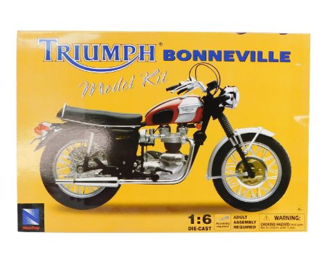 A Triumph Bonneville model kit, 1:6 scale, diecast, boxed. 