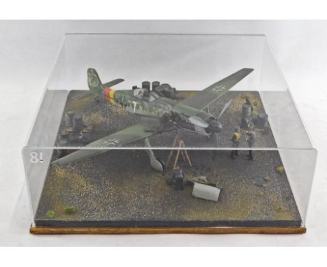 A 1:32 scale diorama of a Messerschmidt Me109G, in perspex case. 