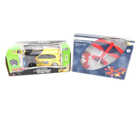 A Nikko radio controlled Street Mayhem Tuner Honda Civic, Type EP-3, 1:14 scale, together with a Marks &amp; Spencer Outdoor 