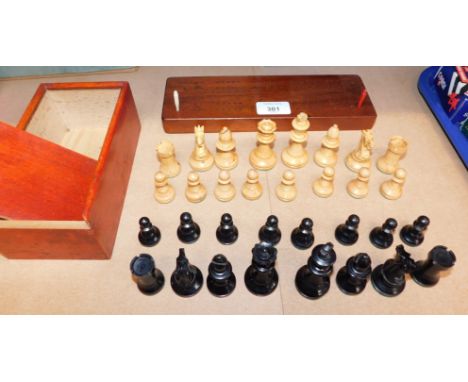 A Staunton chess set and a cribbage marker board.