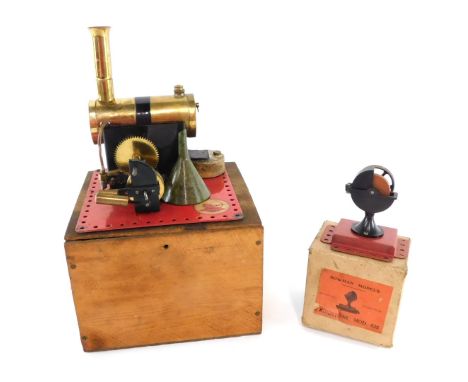 A Bowman Models M140 twin cylinder steam engine, together with an M835 grindstone modification, boxed. (2)