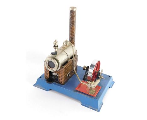 A Wilesco D10 live steam engine, with copper plated boiler house and double action cylinder.