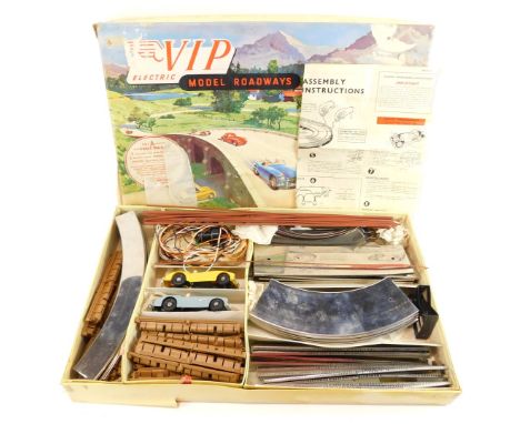 A Victor Industries VIP model roadways set A, including track, 1:32 scale model cars, fencing, etc., boxed. (1)