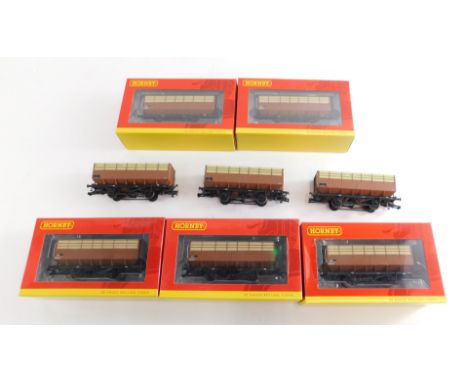 Hornby OO gauge rolling stock, R6830 BR 20 tonne coat hopper wagon pack, and loose BR 28 tonne coal wagons. (8)