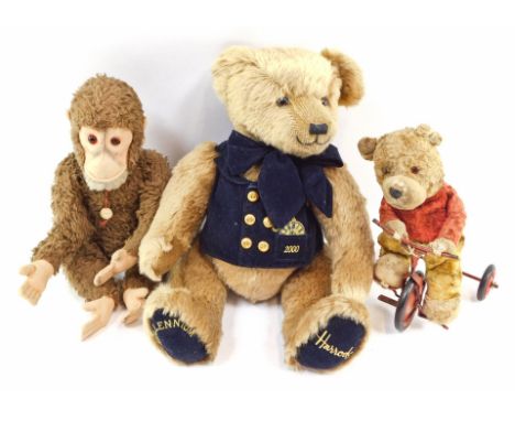 Soft toys, comprising a Merrythought Harrods Millennium bear, a Hermann monkey and a Chiltern Teddy Bear on tricycle. (3)