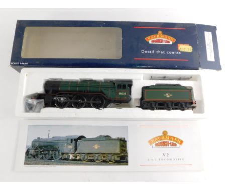 A Bachmann branch line OO gauge class V2 locomotive, 2-6-0, 60825, BR lined green step tender, 31-561, boxed.