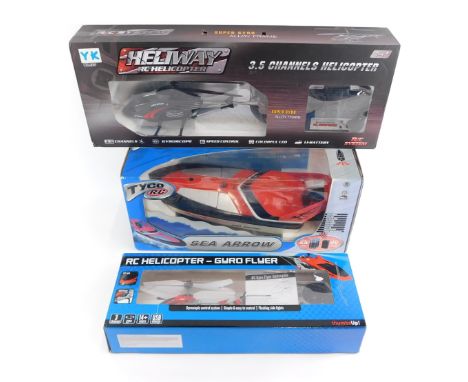 Radio controlled vehicles, comprising a Tyco RC Sea Arrow, RC Helicopter, and a Heliway RC Helicopter.  (3)