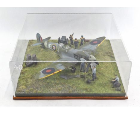 A 1:32 scale diorama of a Spitfire Mark 2, perspex cased. 