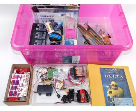 Model making supplies, including an OS max engine, rechargeable lead acid batteries, battery holders, various model making pu
