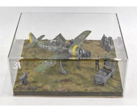 A 1:48 scale diorama of a Focke-Wulf FW 190, in perspex case. 