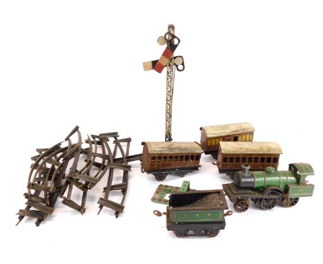 A Hornby tin plate O gauge clockwork train set, to include a GNR 240 locomotive, GNER coaches, signal and track. (1 tray)