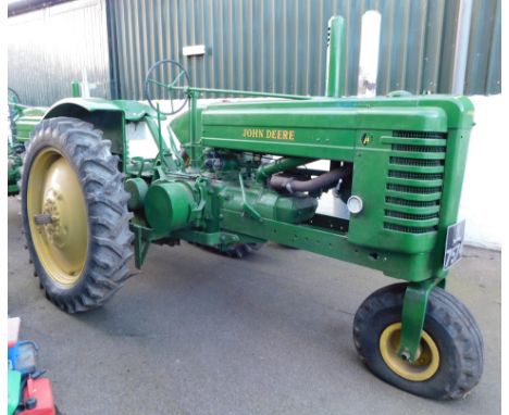 A 1941 John Deere Agricultural Tractor, registration JL 7574, petrol, first registered 03/01/1941, V5 present, later restored