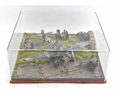 A scale 1:32 diorama of a Focke Wulf FW 190-D, in a perspex case. 