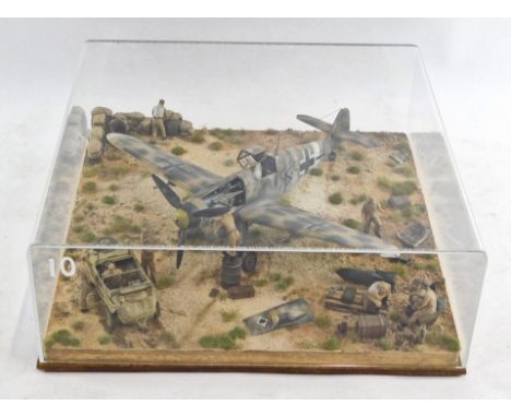 A 1:32 scale diorama of a Messcersmit ME109-G, in perspex case.
