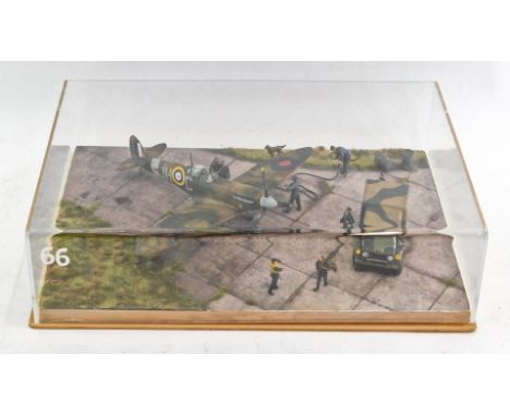 A 1:32 scale diorama of a Mark 5 Spitfire, in a perspex case. 