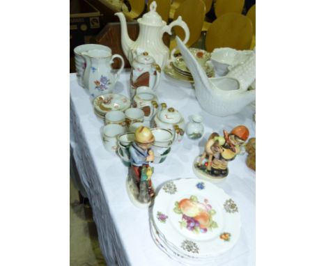 A pair of Hummel style figures of children; decorative china
