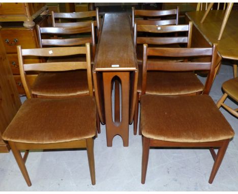 A 1960's G-Plan teak dining suite comprising oval drop leaf table and 6 ladder back chairs