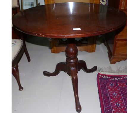 A Georgian mahogany circular tripod table, 31"