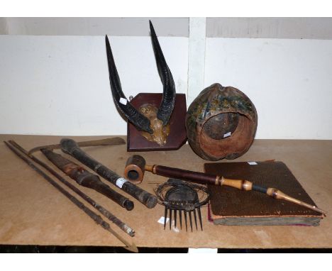 An African tribal axe; a similar knife; other items; an album of cigarette cards