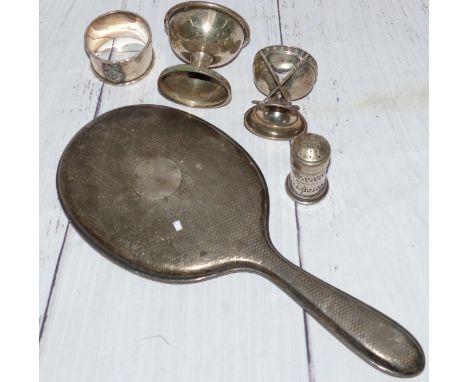 A silver back engine turned hand mirror; a silver golf trophy; a small silver cup and pepper pot