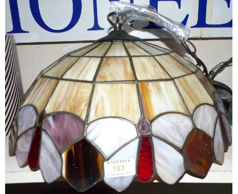 A modern Tiffany style pendant light shade; a painting of Askrigg, North Yorkshire (all Creatures Great & Small)