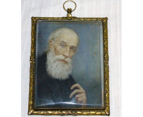 A late 19th/early 20th century half-length portrait miniature:  old man with beard