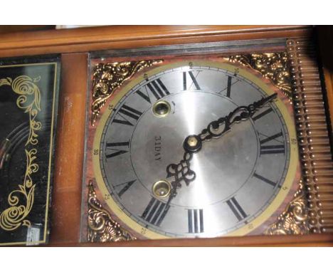 LOT OF THREE CLOCKScomprising one wall clock and two mid-century mantel clocks; together with a lot of collector's spoons