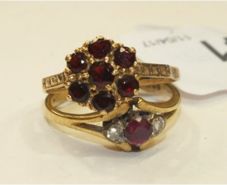 A ruby and diamond ring, size N, and a garnet cluster ring, size O, both 9ct gold, 4.9g.