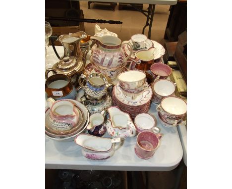 A 19th century Staffordshire pink lustre part tea set, the white body printed and painted with flowers amidst blue and pink l