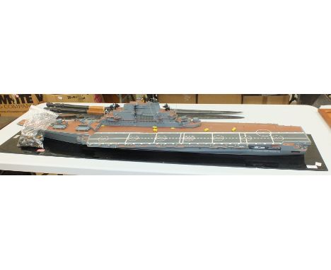 A scale model of the Soviet aircraft carrier "Kiev" built by Norman Hill, 142cm long, with maker's label, (af, some pieces lo