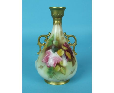 A Royal Worcester porcelain vase painted with roses and with gilt handles and rims, unsigned, 12cm high.