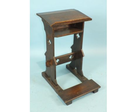 A 19th century oak prayer lectern with folding kneeling stool, stamped 'S Pauling', 41cm wide, standing 70cm high.