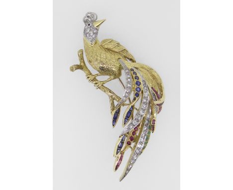 18CT YELLOW GOLD BROOCH IN THE FORM OF A PEACOCK ON BRANCH set with diamonds, sapphires, rubies and emeralds probably by Kutc