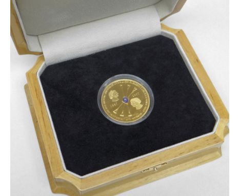 18CT YELLOW GOLD TRISTAN DA CUNHA DIAMOND WEDDING FIVE POUND COIN celebrating the wedding anniversary of H. M. Queen Elizabet